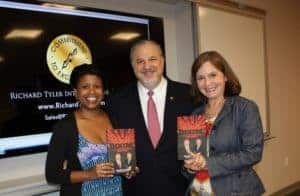 worlds-top-sales-trainer-and-management-consultant-ceo-richard-tyler-with-two-fans-and-their-signed-copies-richard-tylers-best-selling-book-boom